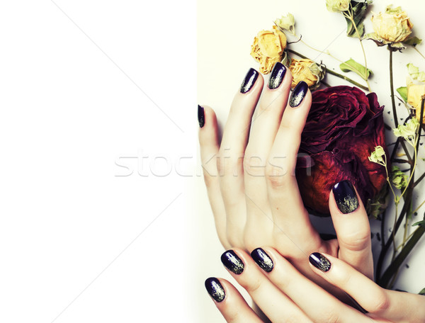 close up picture of manicure nails with dry flower red rose Stock photo © iordani