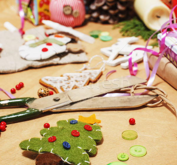 lot of stuff for handmade gifts, scissors, ribbon, paper with countryside pattern, ready for holiday Stock photo © iordani