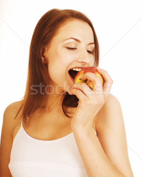 Jonge mooie brunette meisje eten rode appel Stockfoto © iordani