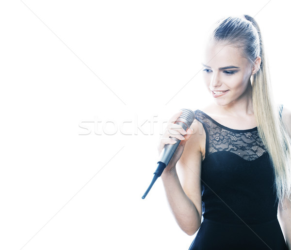 Stock fotó: Fiatal · csinos · szőke · nő · énekel · mikrofon