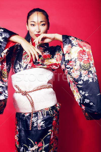 Jungen ziemlich Geisha rot posiert Kimono Stock foto © iordani