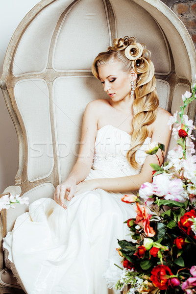beauty young bride alone in luxury vintage interior with a lot of flowers close up Stock photo © iordani