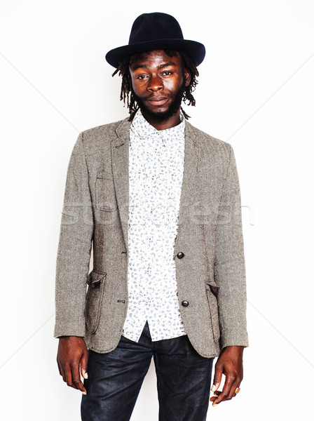 Stock photo: young handsome afro american boy in stylish hipster hat gesturin