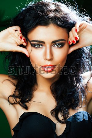 Mooie brunette vrouw make-up zoals demon Stockfoto © iordani