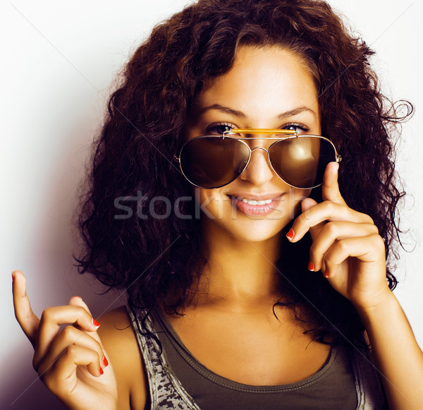 portrait of happy funny real teenage girl with sunglasses Stock photo © iordani