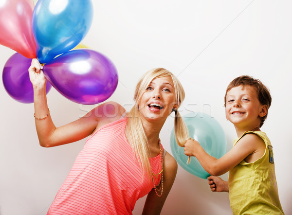 pretty real family with color balloons on white background, blon Stock photo © iordani