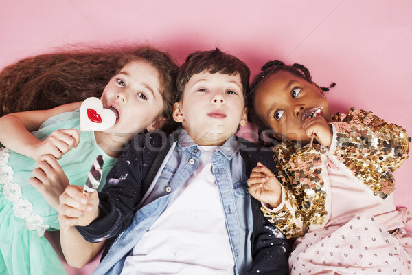 lifestyle people concept: diverse nation children playing together, caucasian boy with african littl Stock photo © iordani