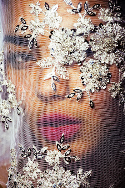 portrait of beauty young afro woman through white lace, like new Stock photo © iordani