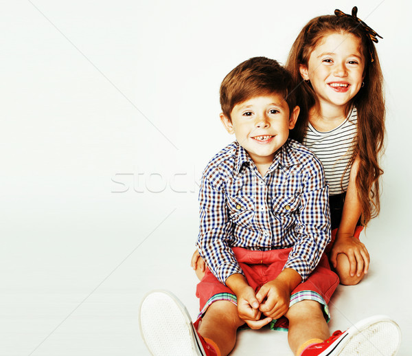 Stock photo: little cute boy and girl hugging playing on white background, ha