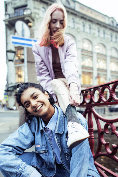 cute young couple of teenagers girlfriends having fun, traveling europe, modern fashion citylife, li Stock photo © iordani