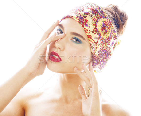young pretty modern girl with bright shawl on head emotional posing isolated on white background, as Stock photo © iordani