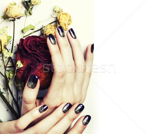 close up picture of manicure nails with dry flower red rose Stock photo © iordani