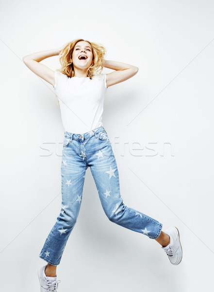 young pretty blond girl jumping isolated on white background, lifestyle flying people concept Stock photo © iordani