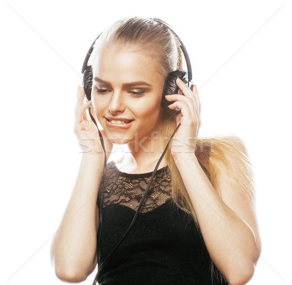 年輕 甜 天才 十幾歲的女孩 頭戴耳機 歌唱 商業照片 © iordani
