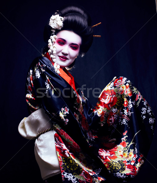 Fiatal csinos gésa kimonó sakura dekoráció Stock fotó © iordani