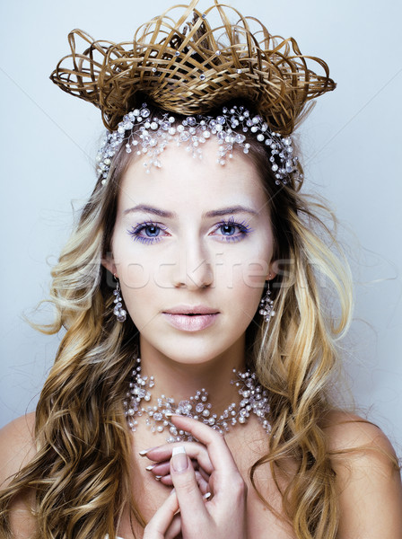 beauty young snow queen in fairy flashes with hair crown on her head Stock photo © iordani