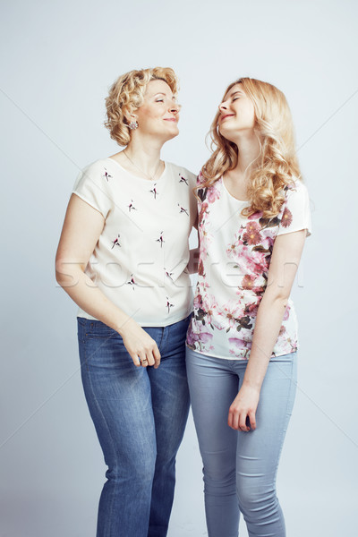 mother with daughter together posing happy smiling isolated on white background with copyspace, life Stock photo © iordani
