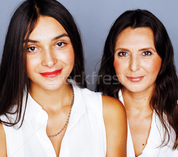 cute pretty teen daughter with mature mother hugging, fashion st Stock photo © iordani