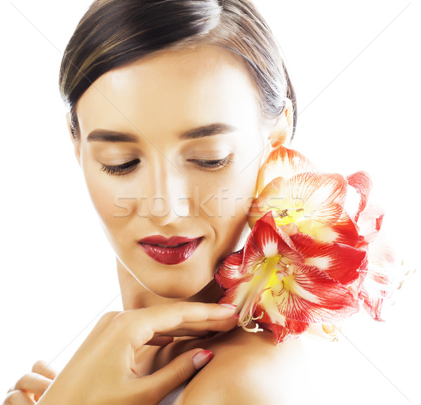 young pretty brunette woman with red flower amaryllis close up i Stock photo © iordani