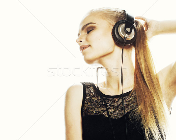young sweet talented teenage girl in headphones singing isolated Stock photo © iordani