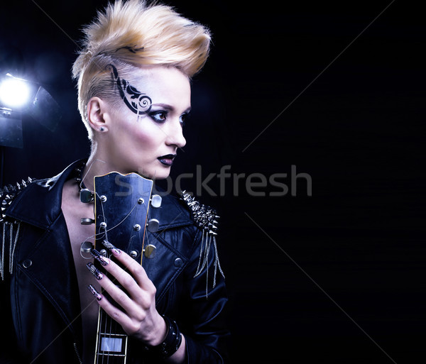 Fashion Rocker Style Model Girl Portrait. Hairstyle. Punk Woman Makeup, Hairdo and black Nails. Smok Stock photo © iordani