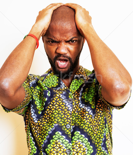 portrait of young handsome african man wearing bright green nati Stock photo © iordani