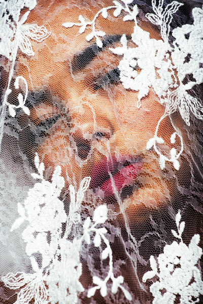 portrait of beauty young afro woman through white lace, like new Stock photo © iordani