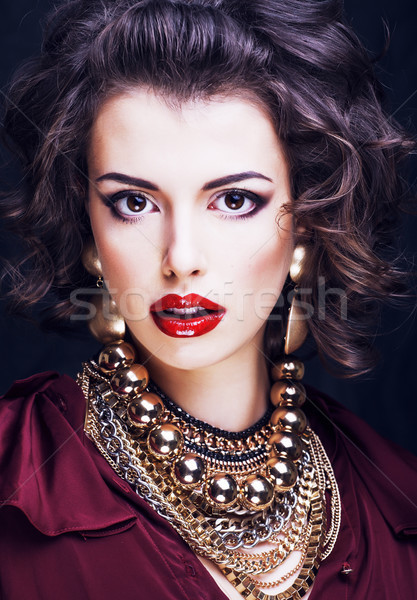 beauty rich brunette woman with a lot of jewellery Stock photo © iordani