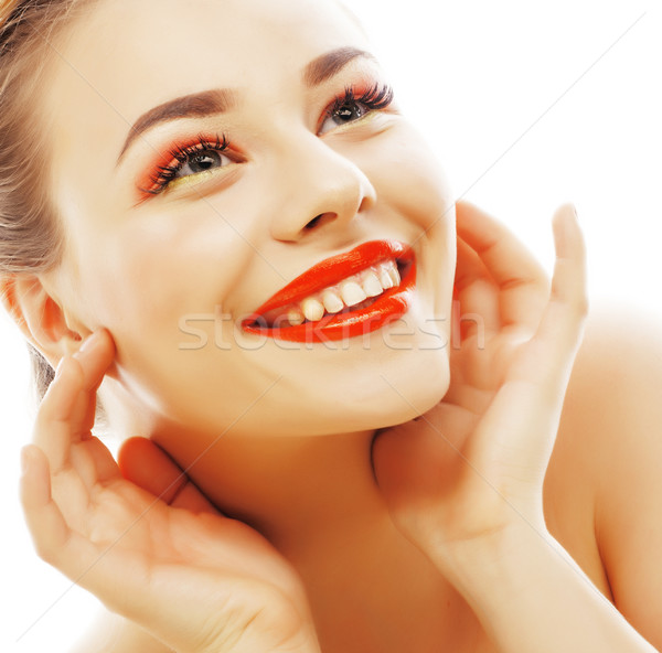 young blond woman with bright make up smiling pointing gesturing Stock photo © iordani