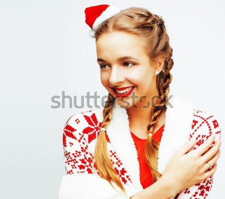 young pretty happy smiling blond woman on christmas in santas red hat and holiday decorated plaid, l Stock photo © iordani