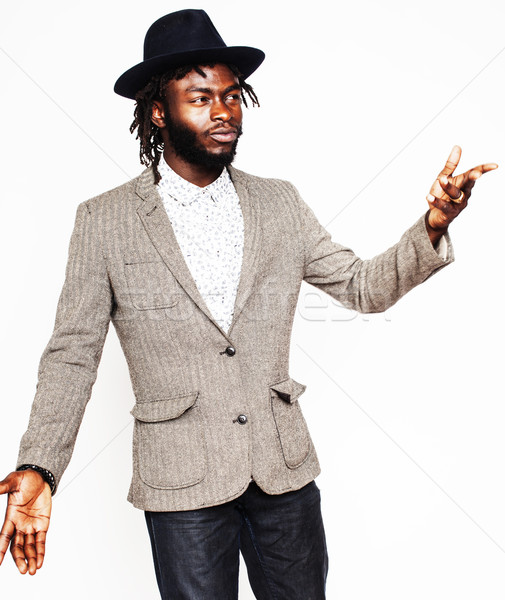young handsome afro american boy in stylish hipster hat gesturin Stock photo © iordani