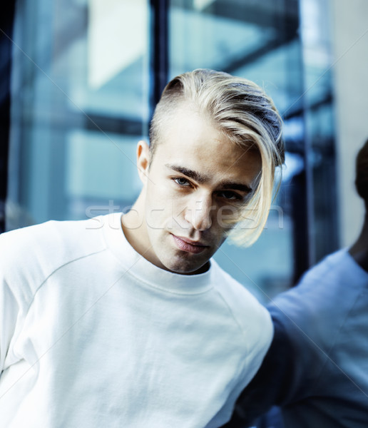 Young Modern Hipster Guy At New Building University Blond Fashion