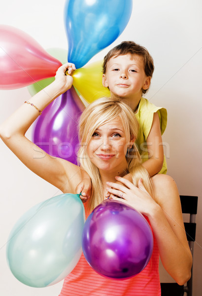 pretty real family with color balloons on white background, blon Stock photo © iordani