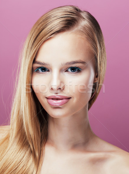 young pretty blonde woman with hairstyle close up and makeup on pink  Stock photo © iordani