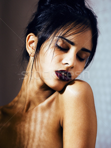 Joli brunette femme composent comme démon [[stock_photo]] © iordani
