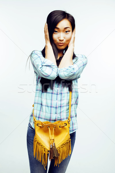 young pretty asian woman posing cheerful emotional isolated on white background, lifestyle people co Stock photo © iordani