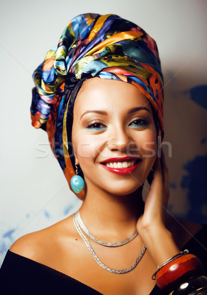 Stock photo: beauty bright african woman with creative make up, shawl on head