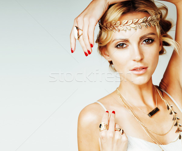 young blond woman dressed like ancient greek godess, gold jewelr Stock photo © iordani