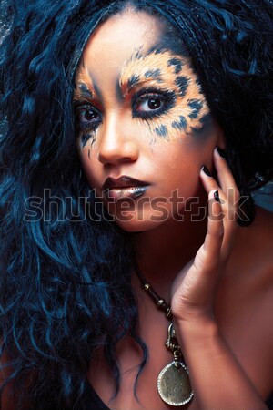 beauty afro girl with cat make up, creative leopard print closeu Stock photo © iordani