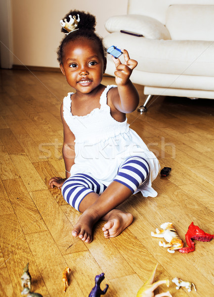 Piccolo cute african american ragazza giocare animale Foto d'archivio © iordani