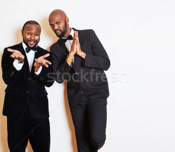 Zwei Geschäftsleute schwarz Anzüge gefühlvoll posiert Stock foto © iordani