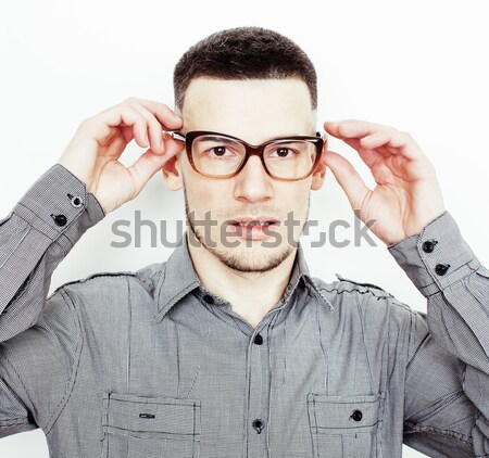 young handsome well-groomed guy posing emotional on white background, lifestyle people concept Stock photo © iordani