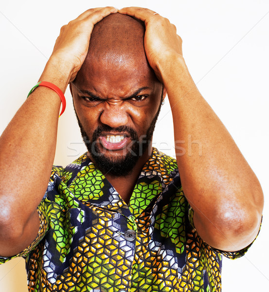 portrait of young handsome african man wearing bright green nati Stock photo © iordani