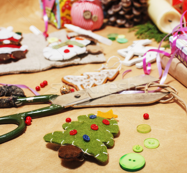 lot of stuff for handmade gifts, scissors, ribbon, paper with countryside pattern, ready for holiday Stock photo © iordani