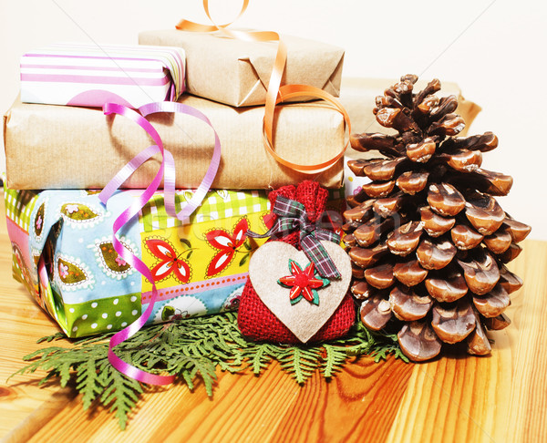 handmade christmas gifts in mess with toys, candles, fir, ribbon wooden vintage Stock photo © iordani