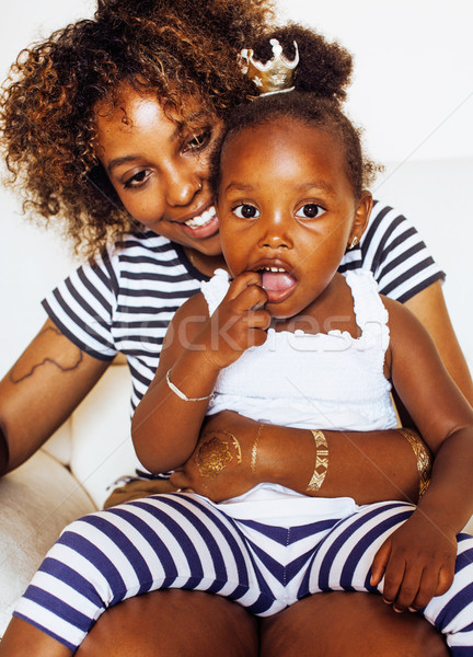 adorable sweet young afro-american mother with cute little daugh Stock photo © iordani