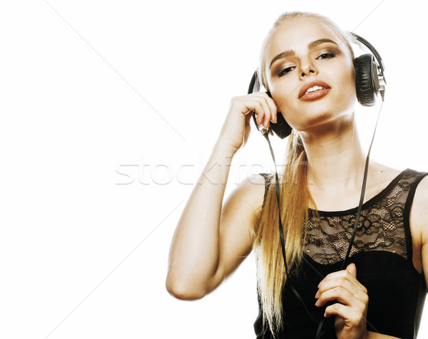 年輕 甜 天才 十幾歲的女孩 頭戴耳機 歌唱 商業照片 © iordani