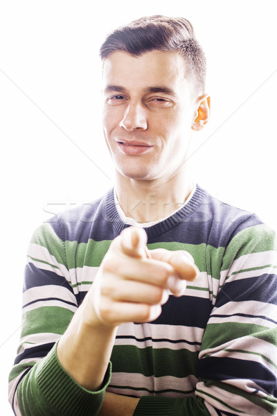 Portrait of a smart serious young man standing against white bac Stock photo © iordani