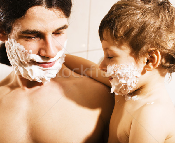 Portrait of son and father enjoying while shaving together, lifestyle people concept, happy family Stock photo © iordani
