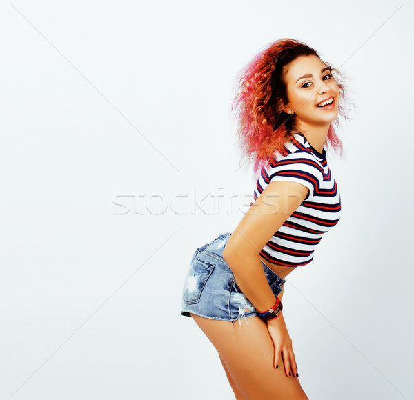 young cute mixed races girl teenage posing cheerfull on white background isolated, happy smiling lif Stock photo © iordani